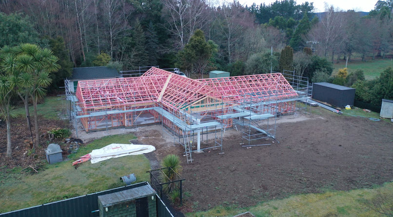 Timber frame structure of new home being built in New Zealand