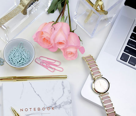 pink roses with laptop, notebook, clips and watch