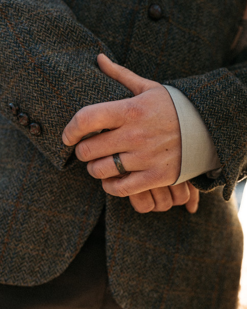 Close up of groom's wedding ring