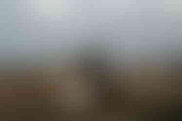 Couple on adventurous walk on the Quiraing, Isle of Skye