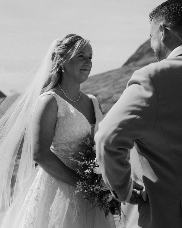 Bride smiling at groom in Glen Etive