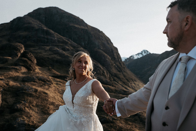 Couple holding hands during Glencoe portrait session