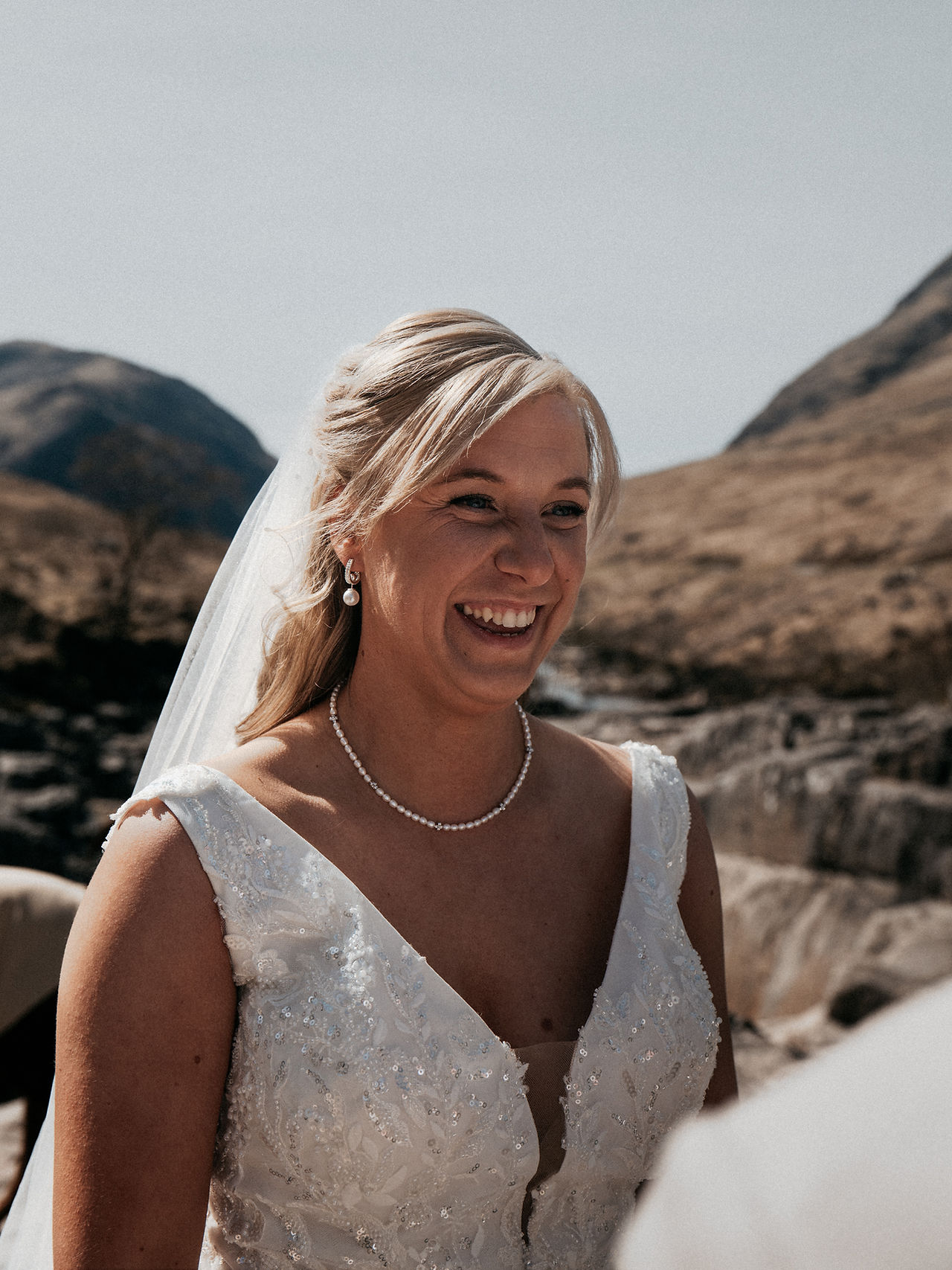 Bride smiling during Glen Etive elopement ceremony