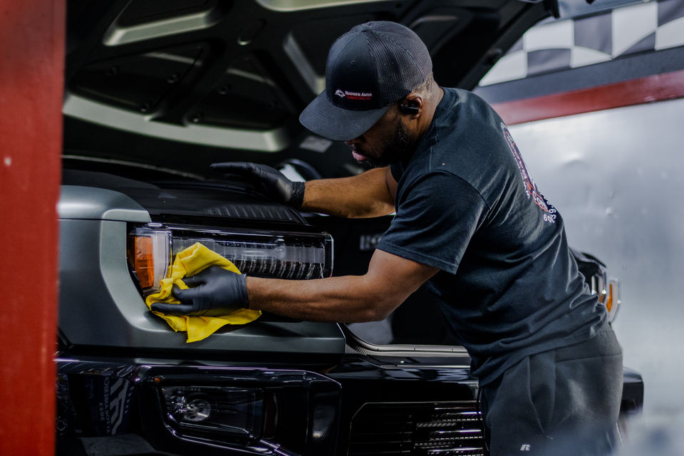 Tory, an Auto Detailer from Badger Auto Consulting LLC and KS Detail in Cottage Grove, WI photographed while auto detailing by Autovista Media LLC.