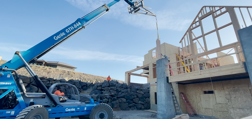a crane during a giant back porch construction with big posts