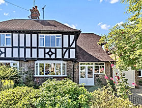 A character Tudor style semi-detached house with a beautiful 150 foot (45.72m) long landscaped rear garden. The property boasts four bedrooms, family bathroom with a shower, a separate shower room, spacious living /dining room, an extended kitchen/ breakfast room and a garage with its own drive.