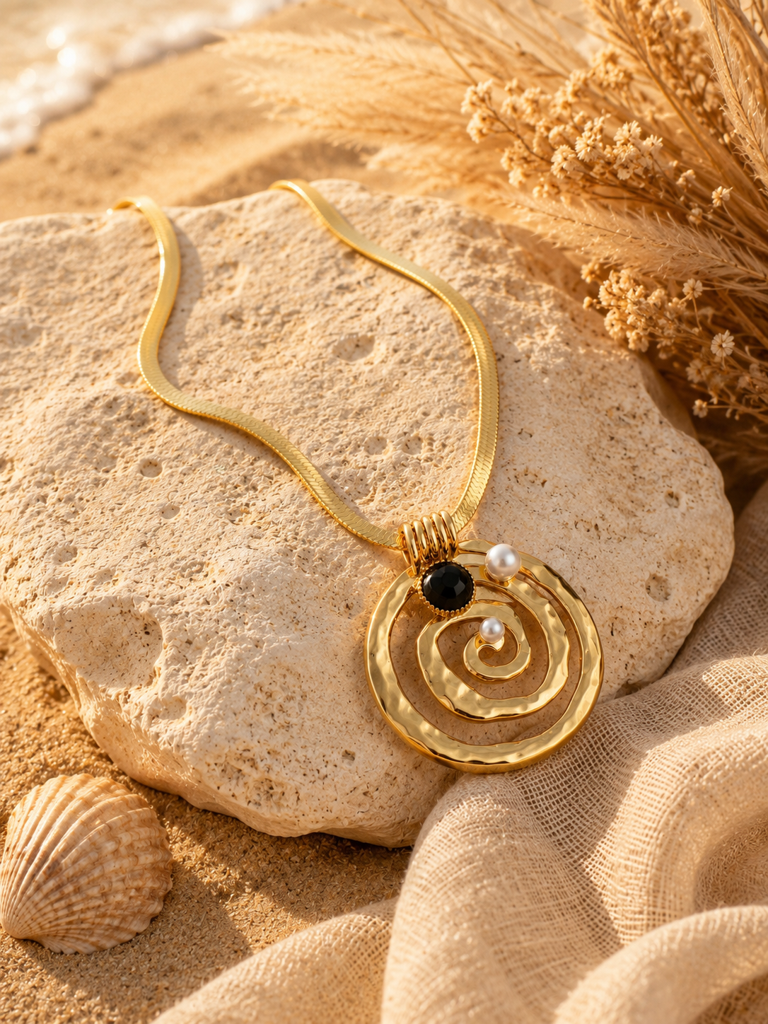 Collier pendentif spirale doré