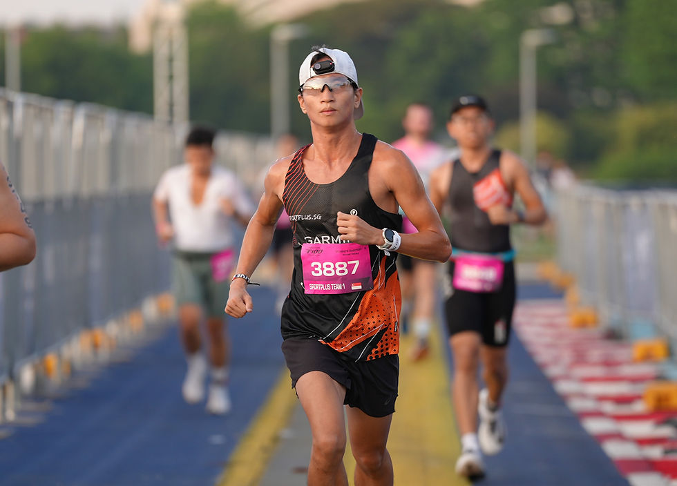 Running content creator Raymond Sng with an Insta360 GO 3S head mount during this year's Singapore T100 relay race at F1 Pit Building. PHOTO: SPORTPLUS.SG / MUHAMMAD HELMI