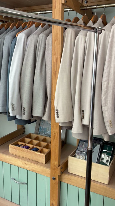A selection of suits in our summer sale