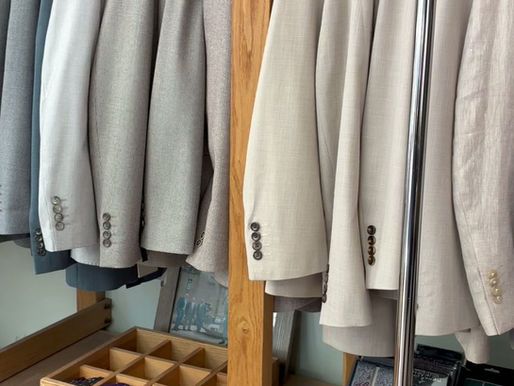 A selection of suits in our summer sale