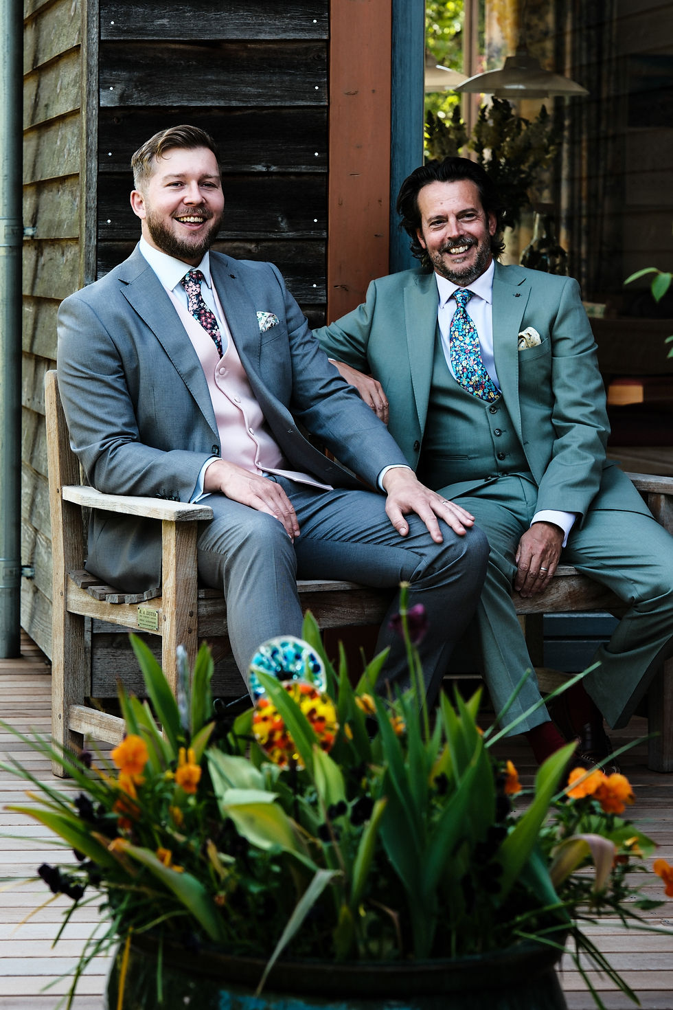 Rich grey and sage suits with contrast waistcoat