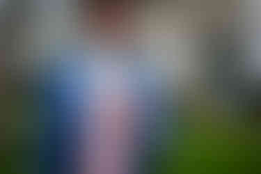 Mid-blue summer suit with pink double-breasted waistcoat