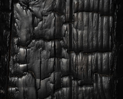 Charred wood surface of the Yaki Floor Lamp