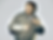 Model wearing a grey jacket in a clean on-model product visual.