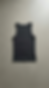Dark grey sleeveless top shown as a clean product visual.