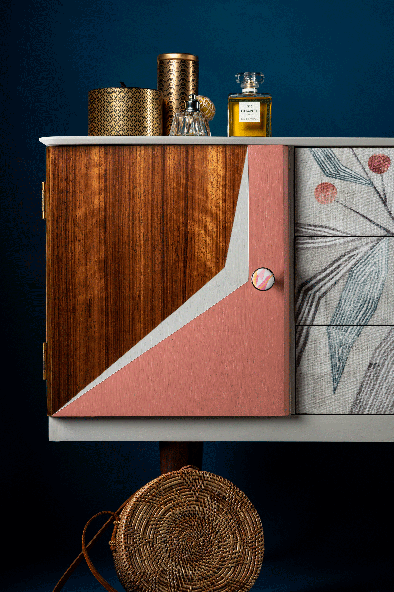 Modern sideboard with pink geometric design.gif