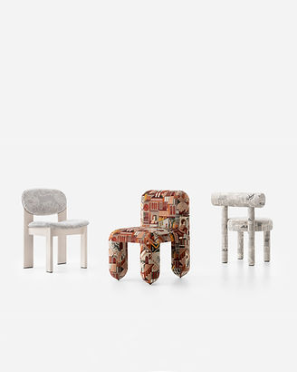 Upholstered desinger dining chairs in patterened vevlet