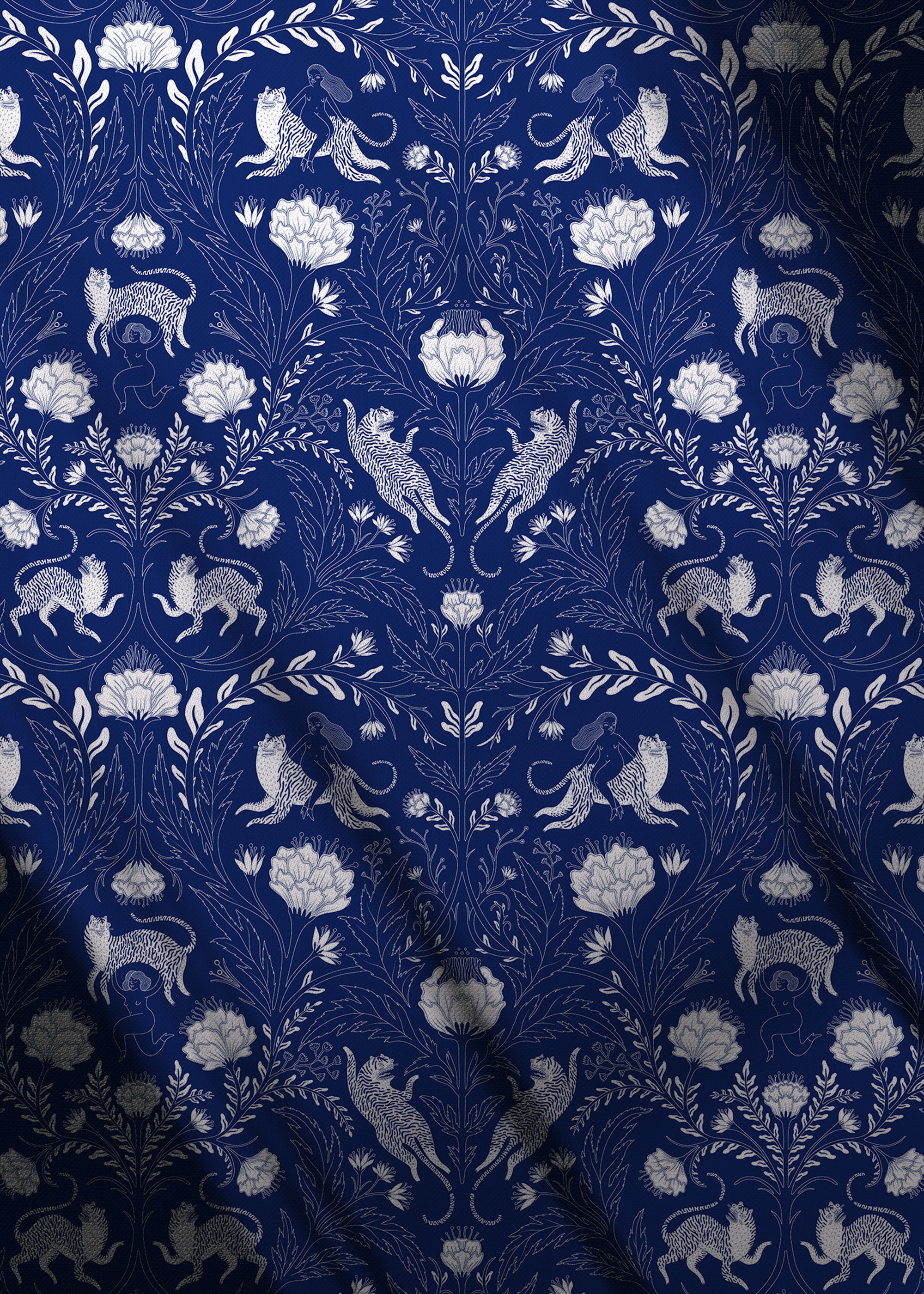 deep blue patterned textile with florals and prowling tigers, ideal for upholstery, curtains, and statement headboards.