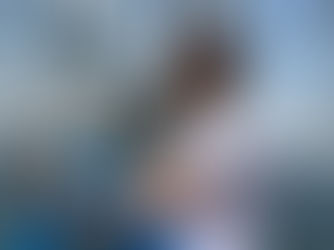 A woman looking at a lake