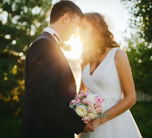 Bride and groom outdoors