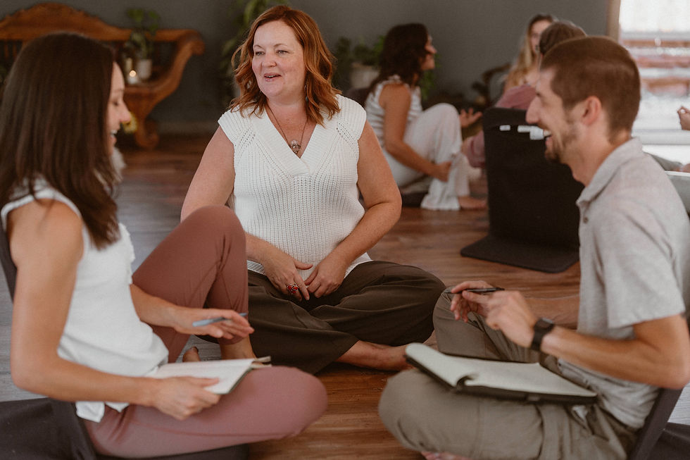 3 people speak at a facilitator training