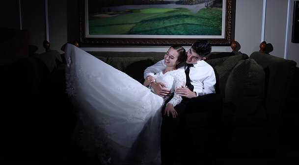 LDS Temple wedding of Isabella and Jakob wedding in Charleston, North Carolina - moody shot under spotlight