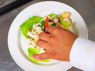 cooking at Trattoria Trecolori