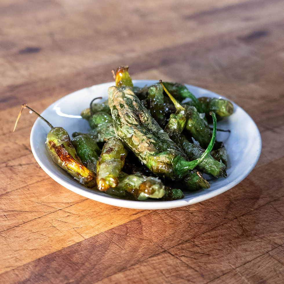 Classic Galician tapas Padrón peppers at Tomiño Spanish restaurant NYC
