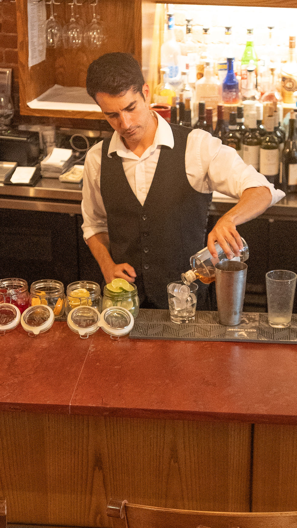 Bartender pouring a drink