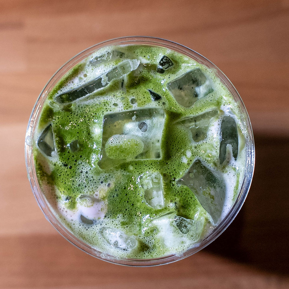 Matcha drinks at Ostro Café in Astoria including iced matcha, strawberry matcha, mango matcha, and behind-the-scenes preparation, showcasing one of the best matcha spots in Queens.