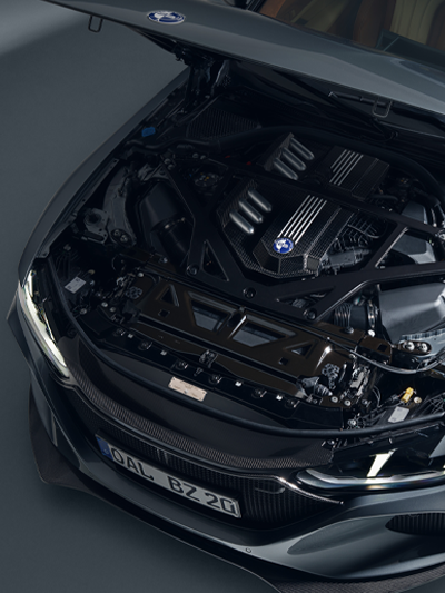 Bovensiepen Zagato engine bay with high-gloss carbon components and black cross-strut brace.