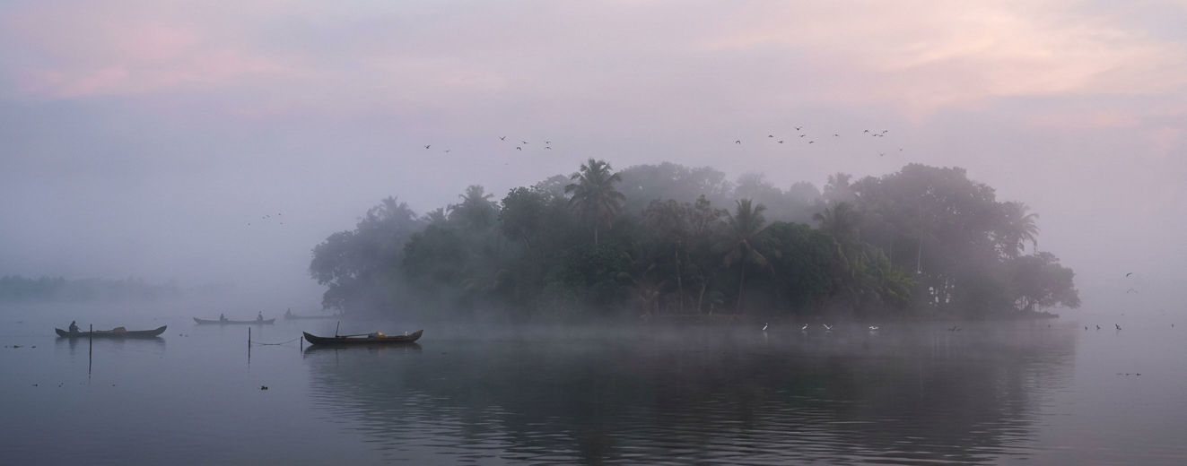 Morning mist over Pathiramanal island Kerala