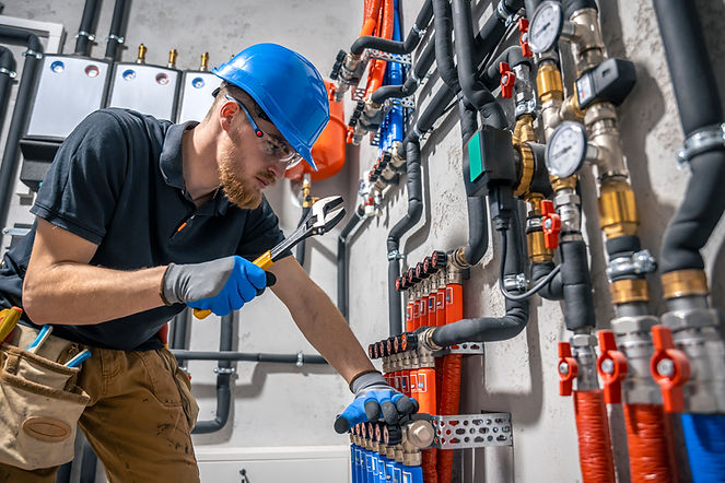 technician-checking-heating-system-boiler-room.jpg