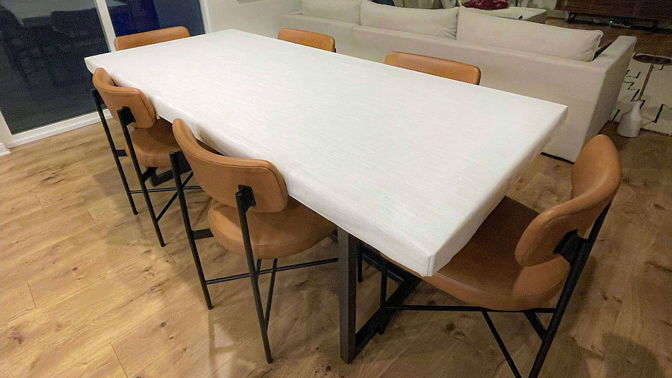 Xavier Natural table cover on a rectangular table in a cozy dining nook with minimalist decor.
