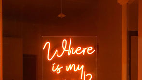 under the neon lights.