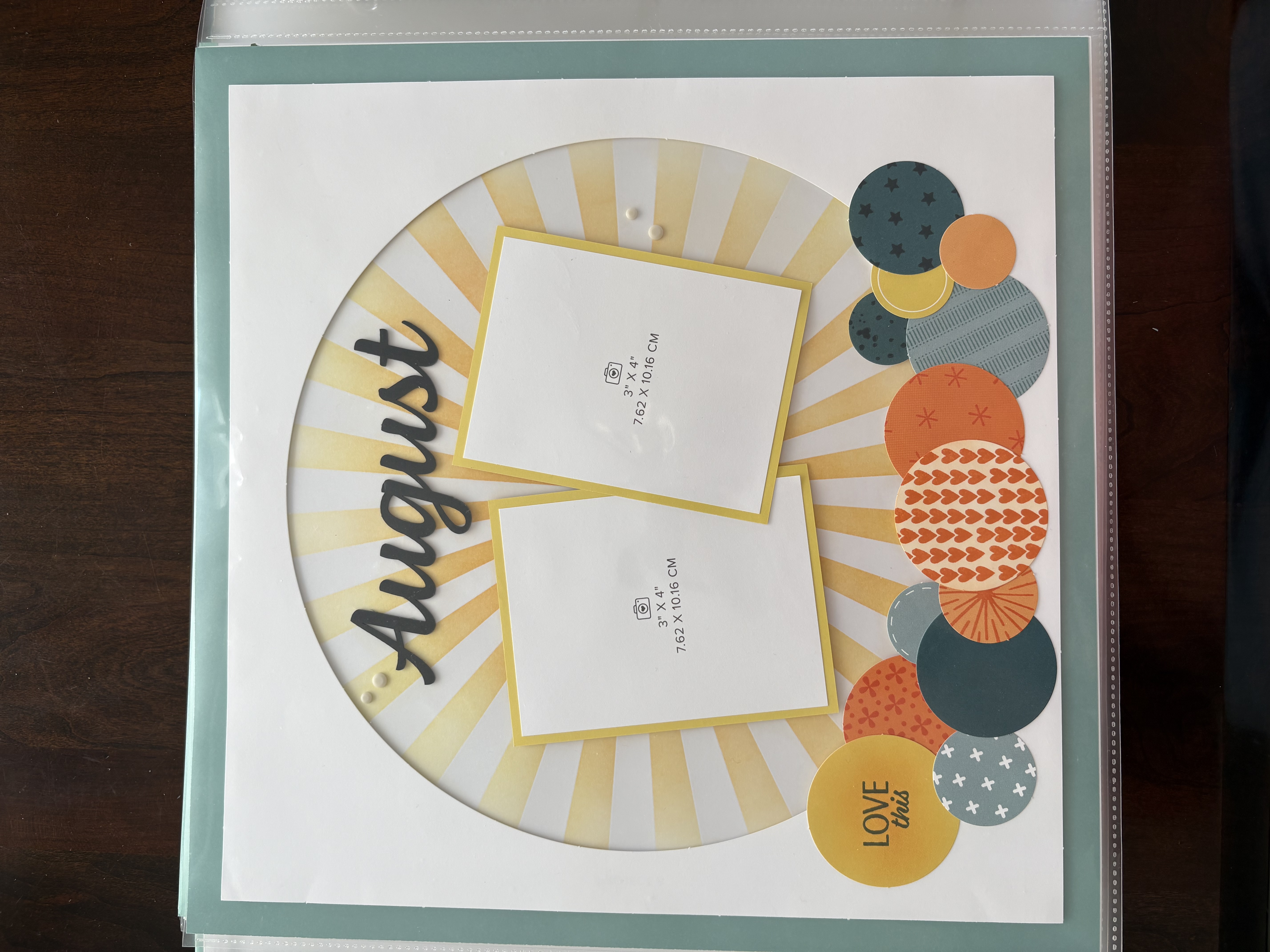 Scrapbook pages and supplies from the Stampin’ Up! Virtual Album Retreat, shown on a craft table.