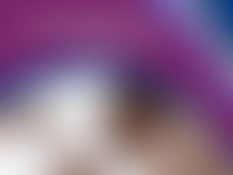 Man sleeping comfortably in a bed.