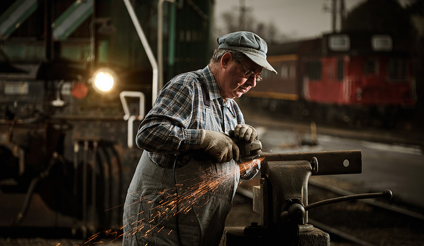 Man outside of workshop, photo by Jonathan Bielaski