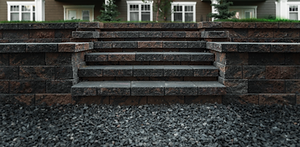 Saskatoon YXE grass green trees houses townhomes house townhome landscape landscaped hardscape stairs rock paving stone pavers 