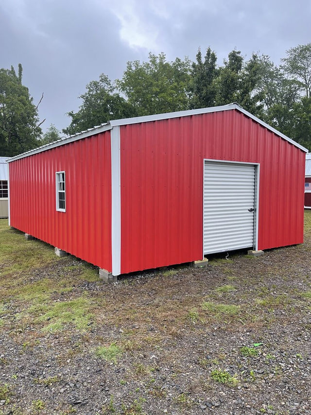 red metal garage with white trim