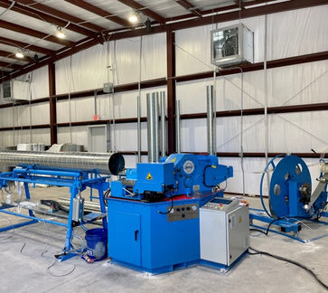 round spiral and equipment in a large warehouse