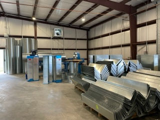 warehouse with large spiral and ductwork ready for pick up or delivery