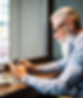 Man completing online telehealth consultation for testosterone therapy on tablet