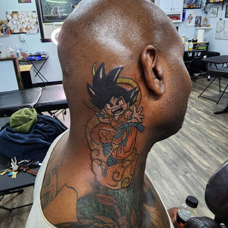goku dragon ball neck tattoo color on dark skin