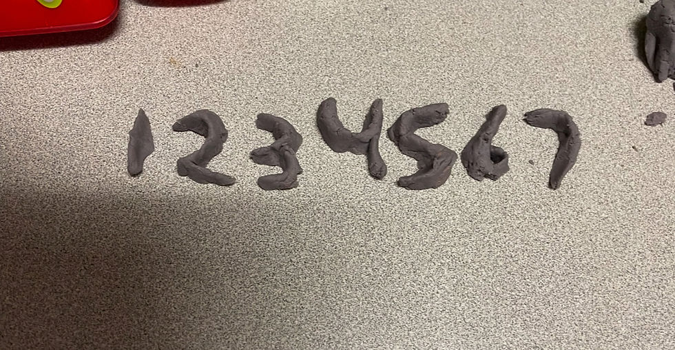 Nyus made 3D numbers out of play-doh!