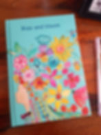 Blue diary of girl with flowers on her head
