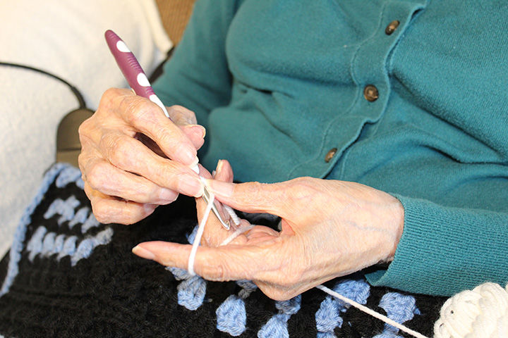 Kitty Johnson’s hands are in constant motion as she crochets the blocks that will be put together in a blanket. Those who receive a blanket from her must answer what color and pattern they prefer. While some may pick the same pattern, Kitty may crochet some blocks a solid color, mixing it in with the other blocks therefore no one receives the same blanket as another. The 88 year old resident of the Browns Valley Health Care Center orders the yarn herself online. Contributed photo