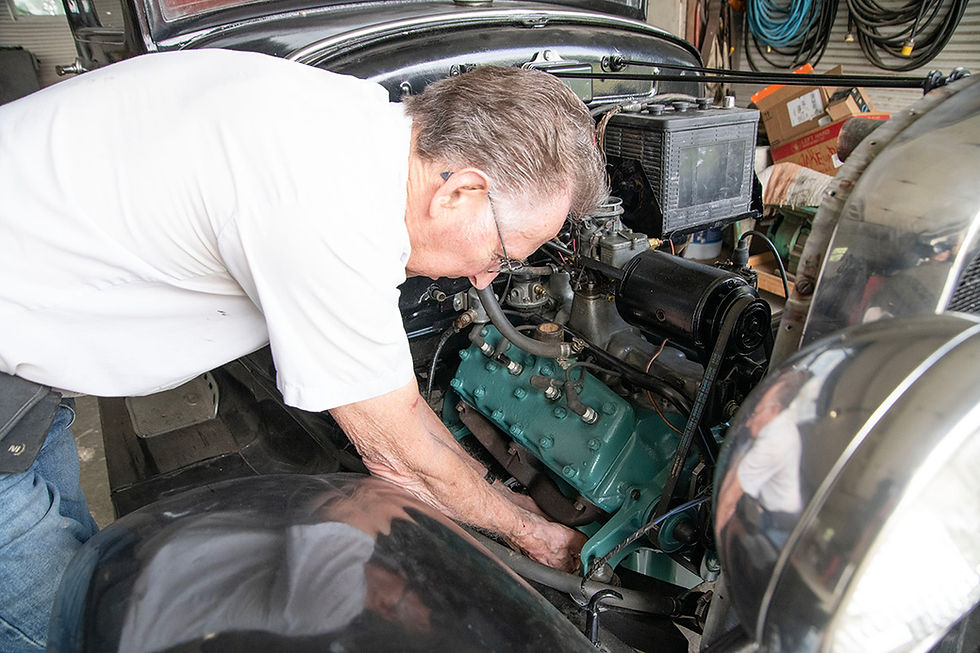 Jerry working on the new V8 engine of the Ford Model A.
Photo by Maggie Gray