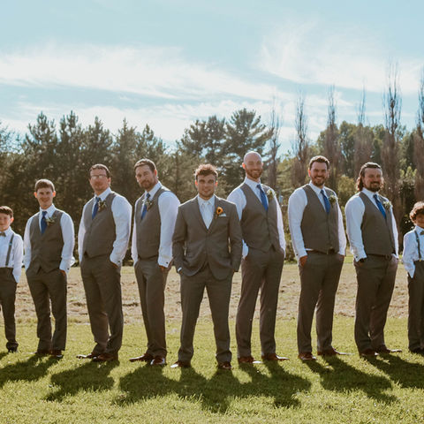Real life wedding photo with Suits and Tuxedos by Collins Clothiers