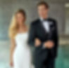 image of a man wearing a black tuxedo with a bride wearing a white dress